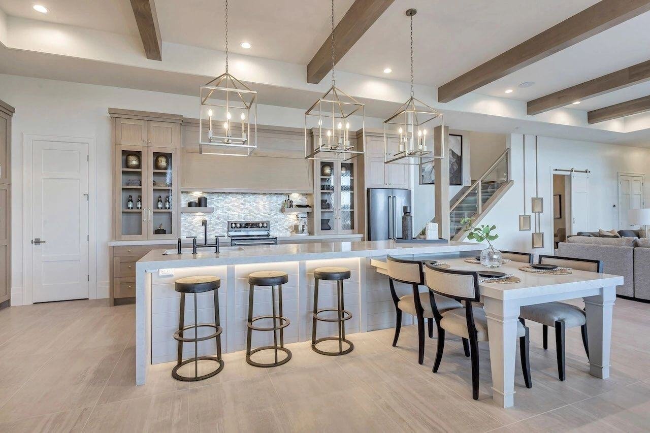 light cabinets and marble countertops of kitchen remodel by E Builders in Utah County 