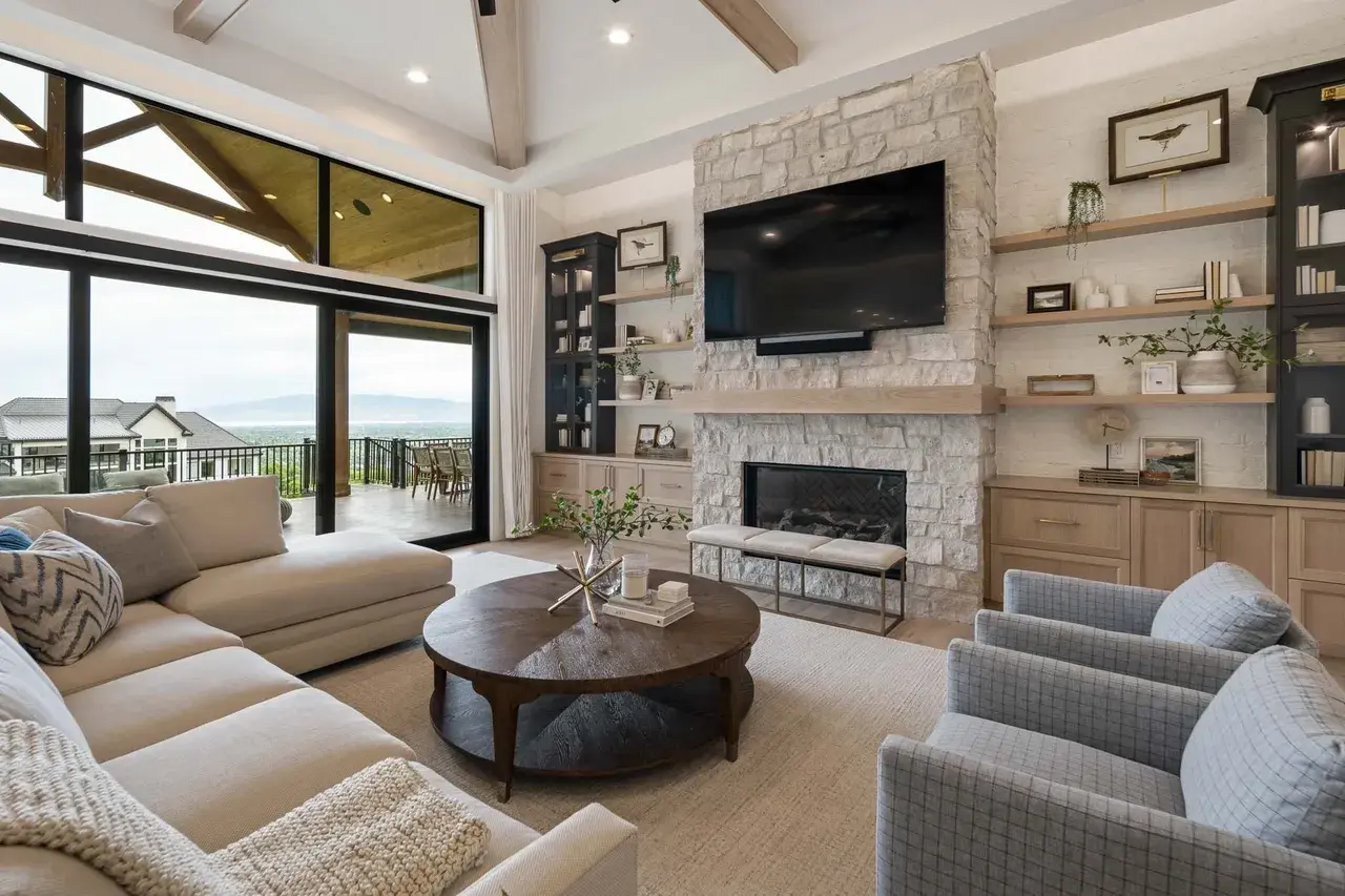 Cozy seating area with built-in shelving in a custom home in Utah Valley by E Builders