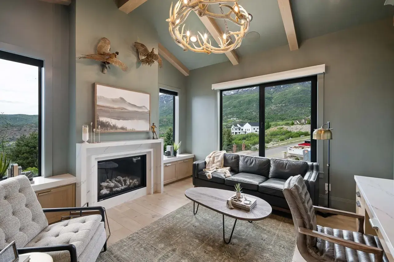 Rustic home office with mountain views in a custom home in Utah Valley by E Builders