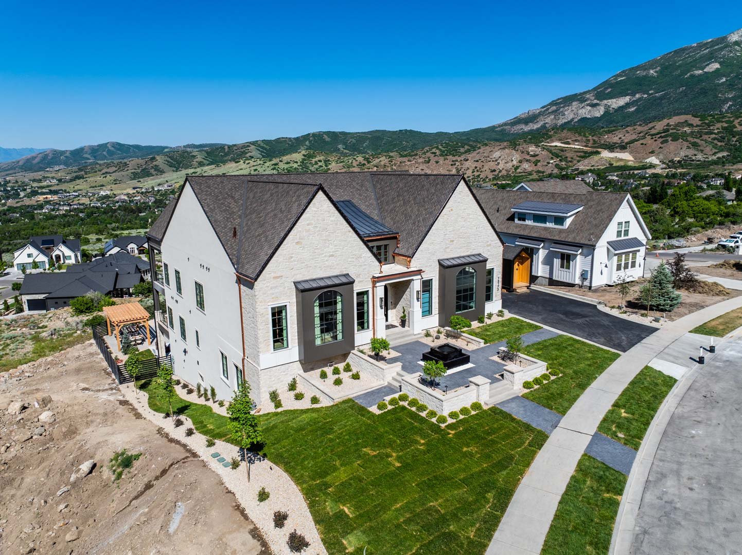 Aerial view of modern luxury exterior in custom home Room with a View featured in the 2025 Utah Valley Parade of Homes by E Builders
