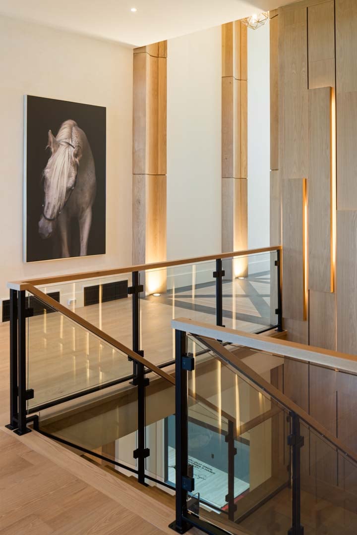 Open stairway design with custom railing in custom home Room with a View featured in the 2025 Utah Valley Parade of Homes by E Builders