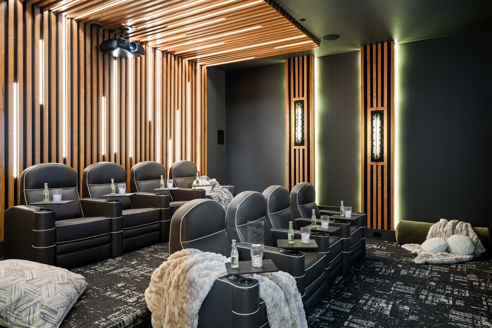 Private theater with luxury recliners in custom home Room with a View featured in the 2025 Utah Valley Parade of Homes by E Builders