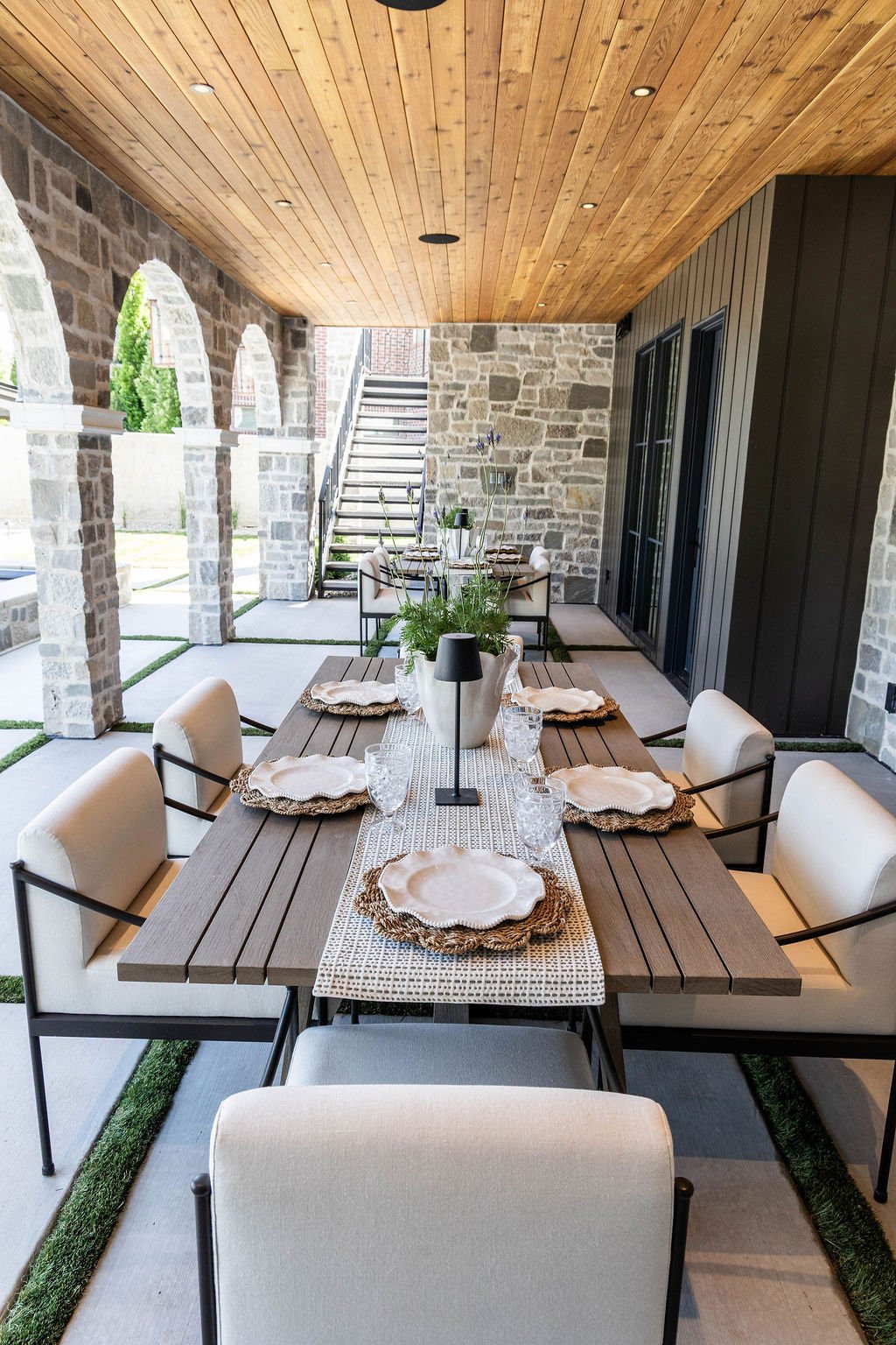 Close-up of patio dining table setup of a custom home featured in the 2025 Utah Valley Parade of Homes