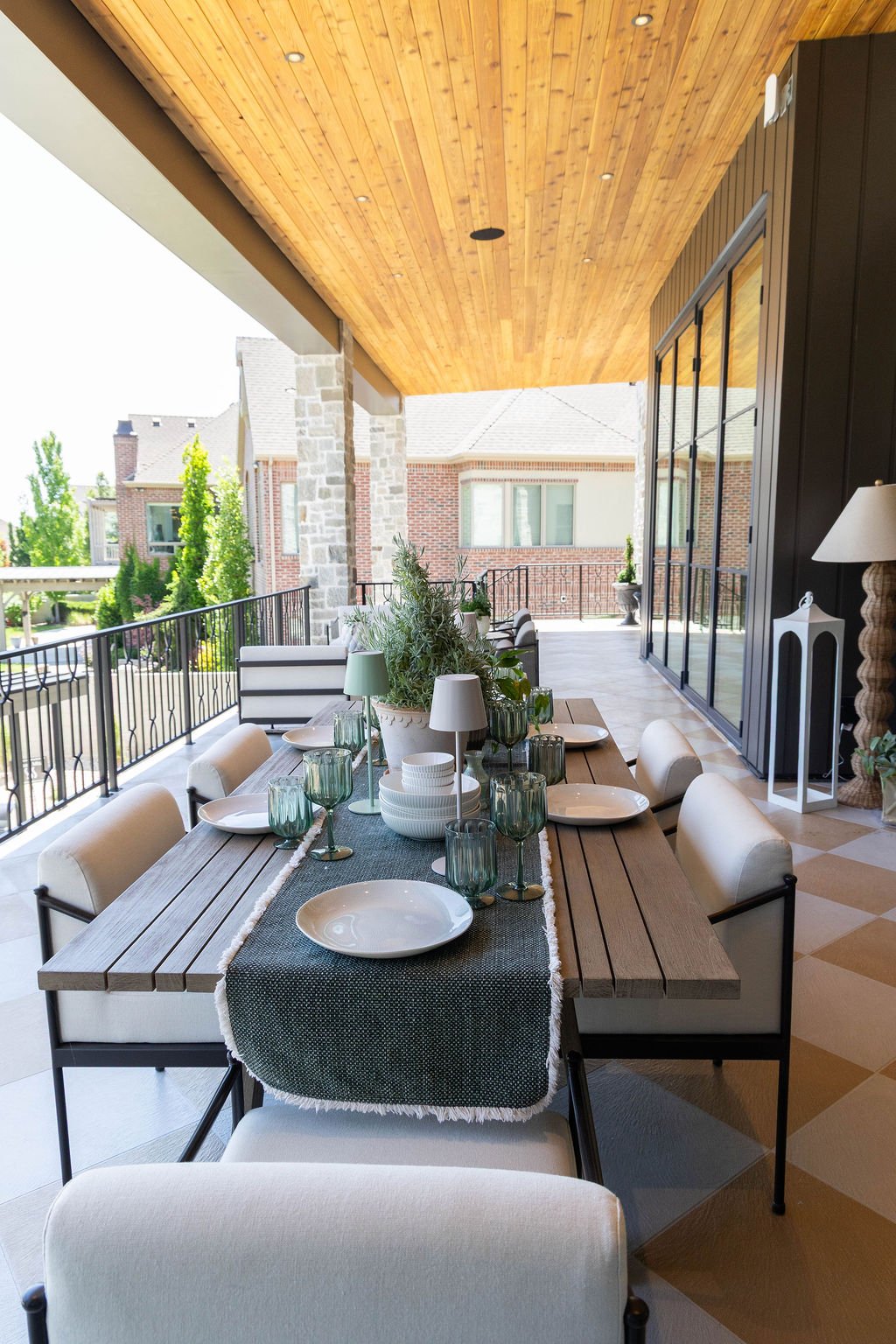 Covered outdoor dining area at a custom home featured in the 2025 Utah Valley Parade of Homes
