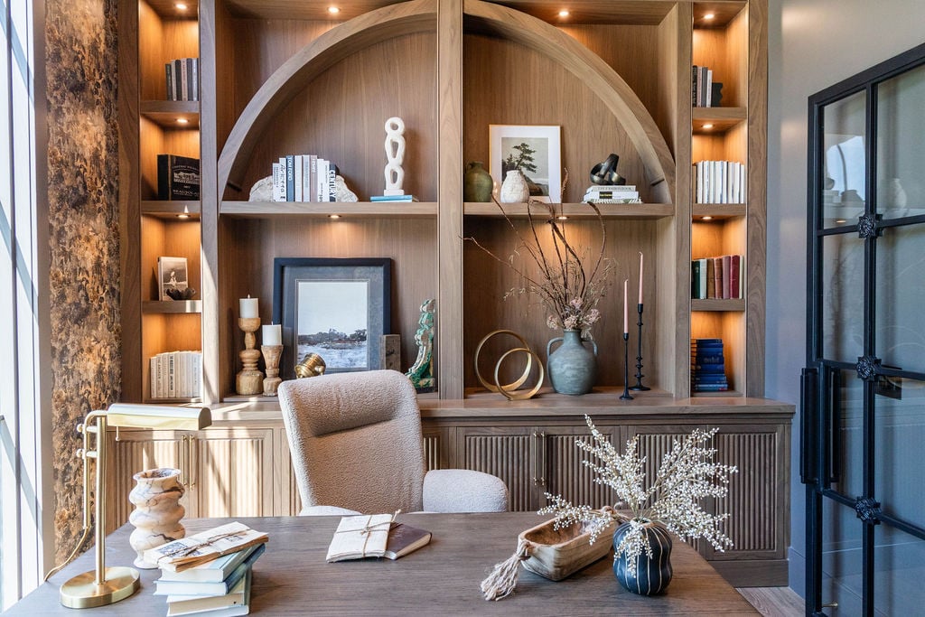 Full home office view with built-in shelves and writing desk in a custom home featured in the 2025 Utah Valley Parade of Homes