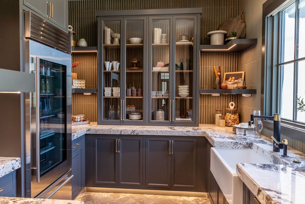 Functional and elegant pantry space with built-ins and modern finishes in a 2025 Parade of Homes custom home