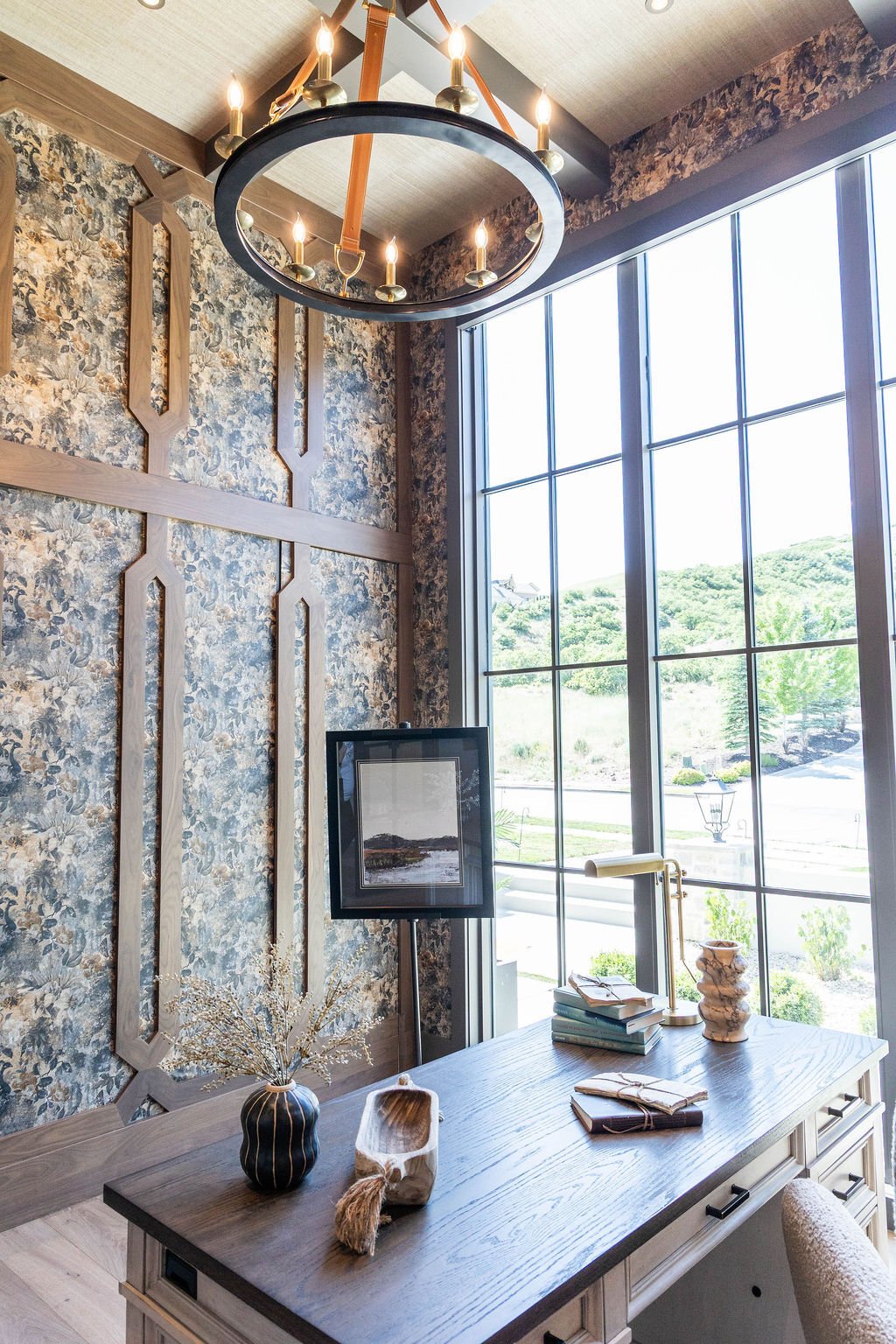 Patterned accent wall and large windows in a home office of a custom home featured in the 2025 Utah Valley Parade of Homes