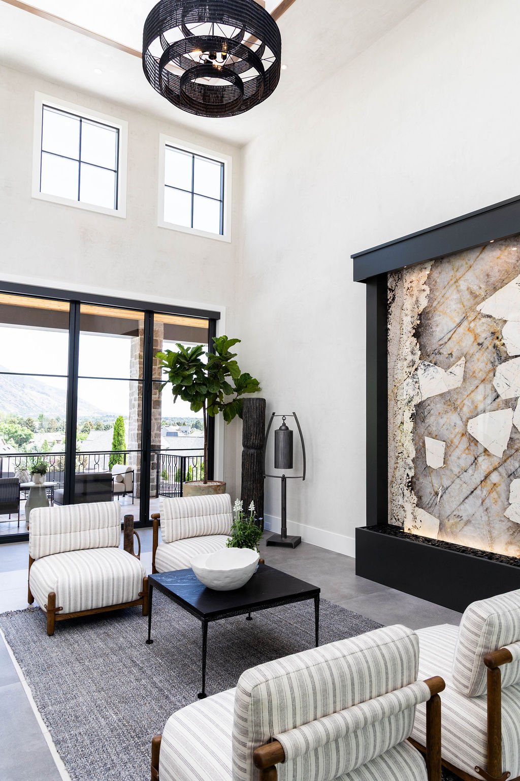 Private courtyard at custom home featured in the 2025 Utah Valley Parade of Homes with modern outdoor seating