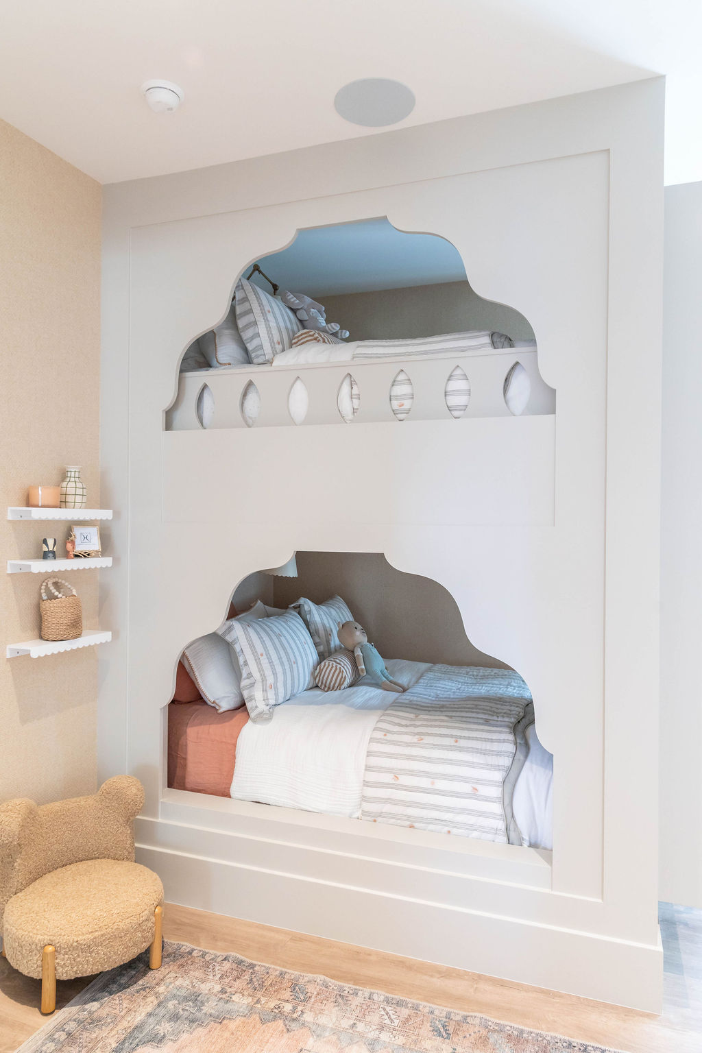 Whimsical built-in bunk beds with decorative cutouts in a custom home featured in the 2025 Utah Valley Parade of Homes