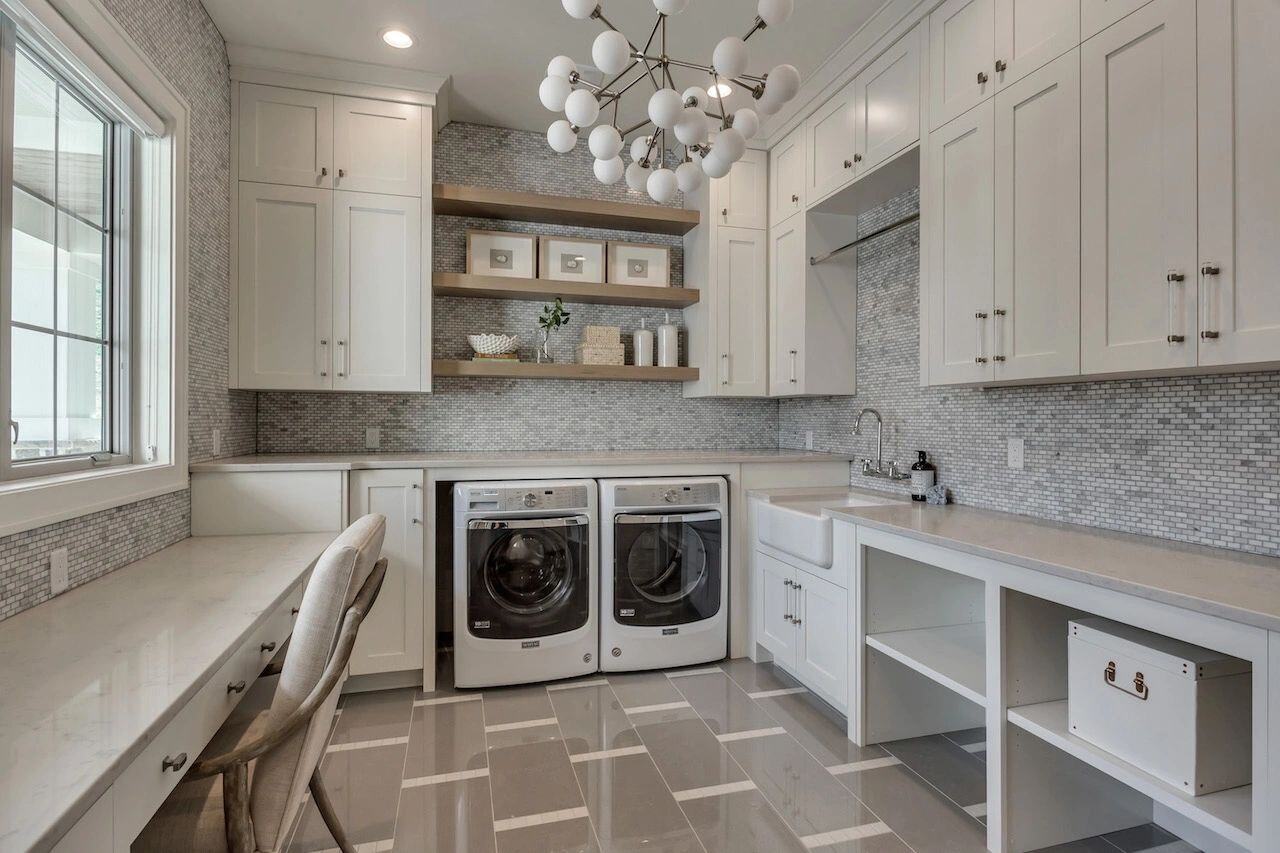 Bright laundry and workspace combination in a custom home in Utah built by E Builders
