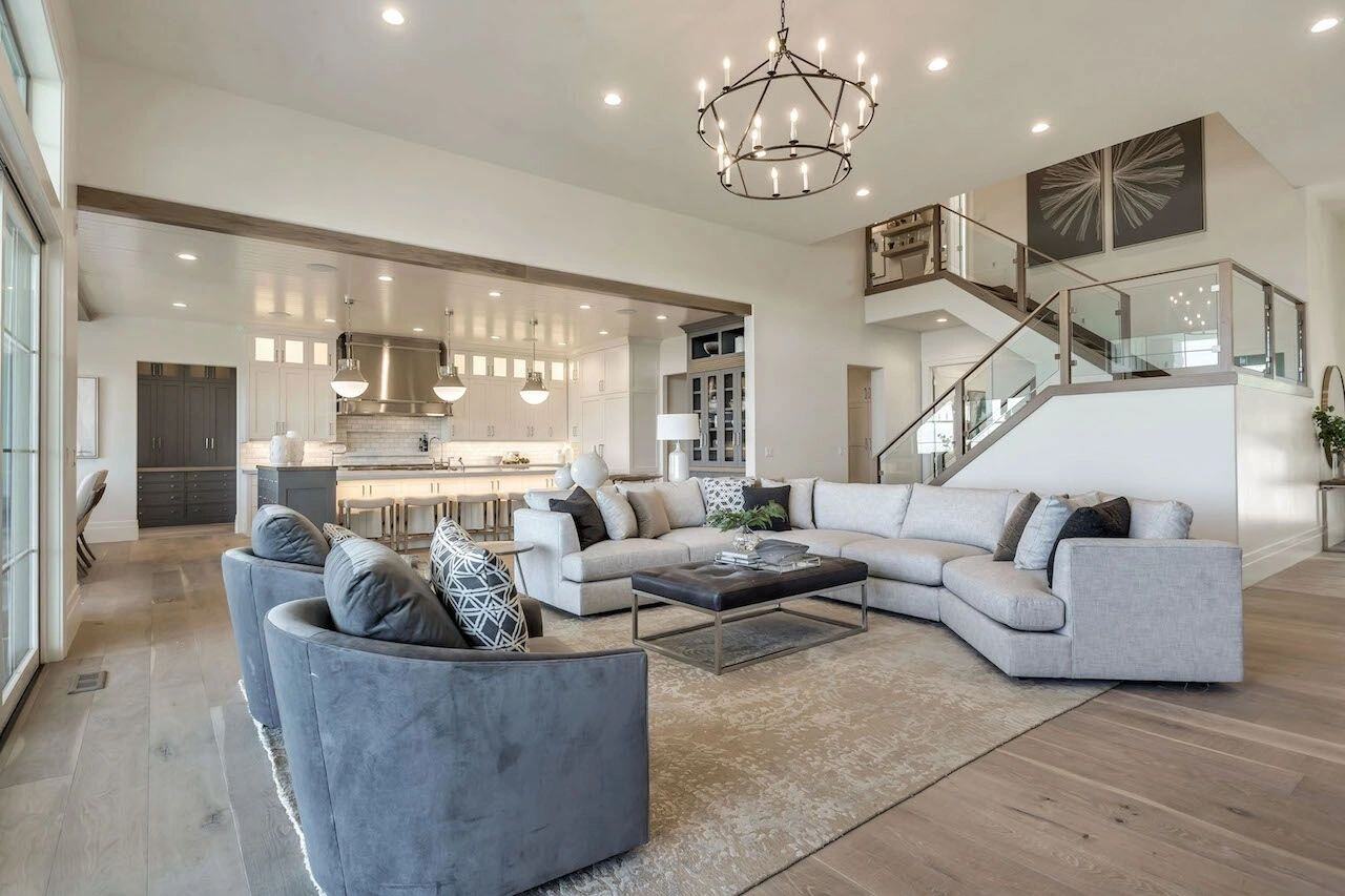 Open concept great room with vaulted ceilings in a custom home in Utah built by E Builders